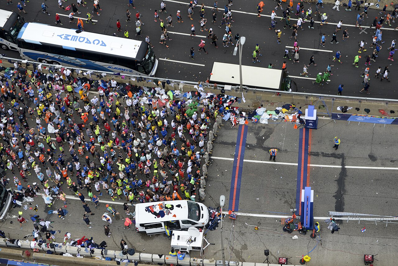 Aerial view of a mass of runners at a race start