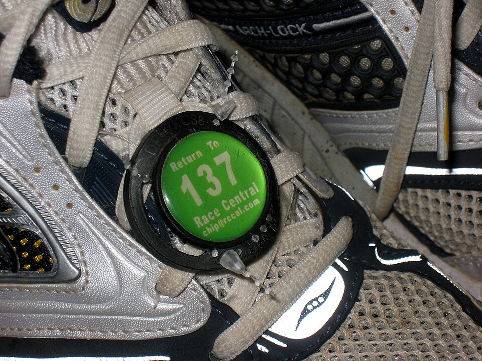 Running shoes with a race timing chip, ready for race day