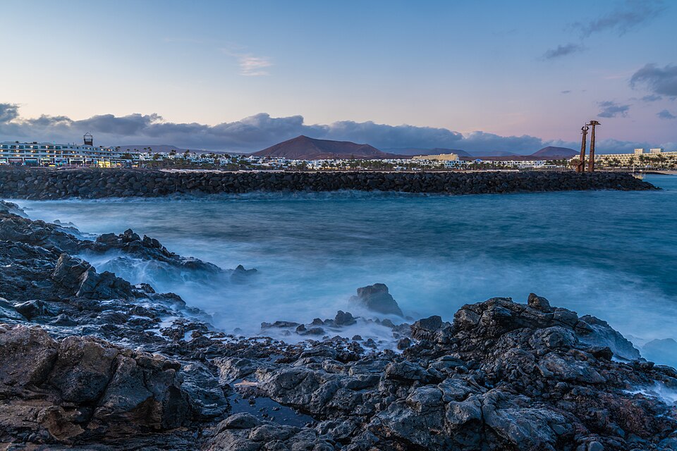 Volcanic rocky coast at Costa Teguise, Lanzarote, at dusk